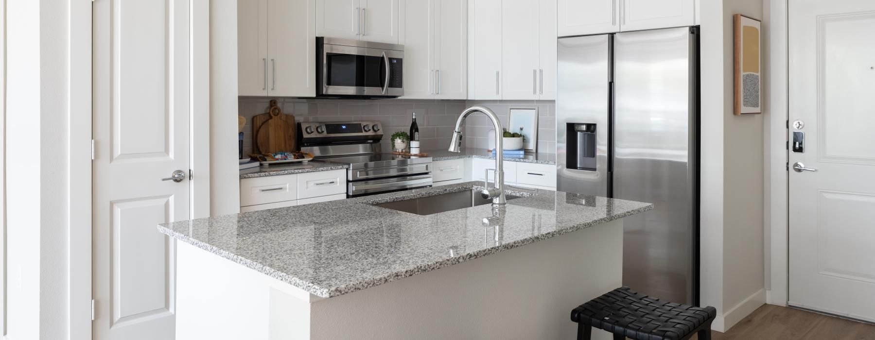 Beautiful kitchens with designer finishes a kitchen with white cabinets