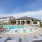lounge chairs surround pool