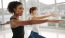 a woman with her arms out