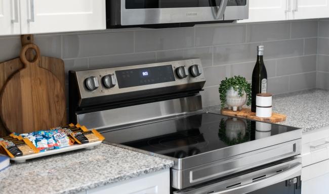 Settle into comfort at Broadstone Sierra Vista a kitchen with a stove and microwave