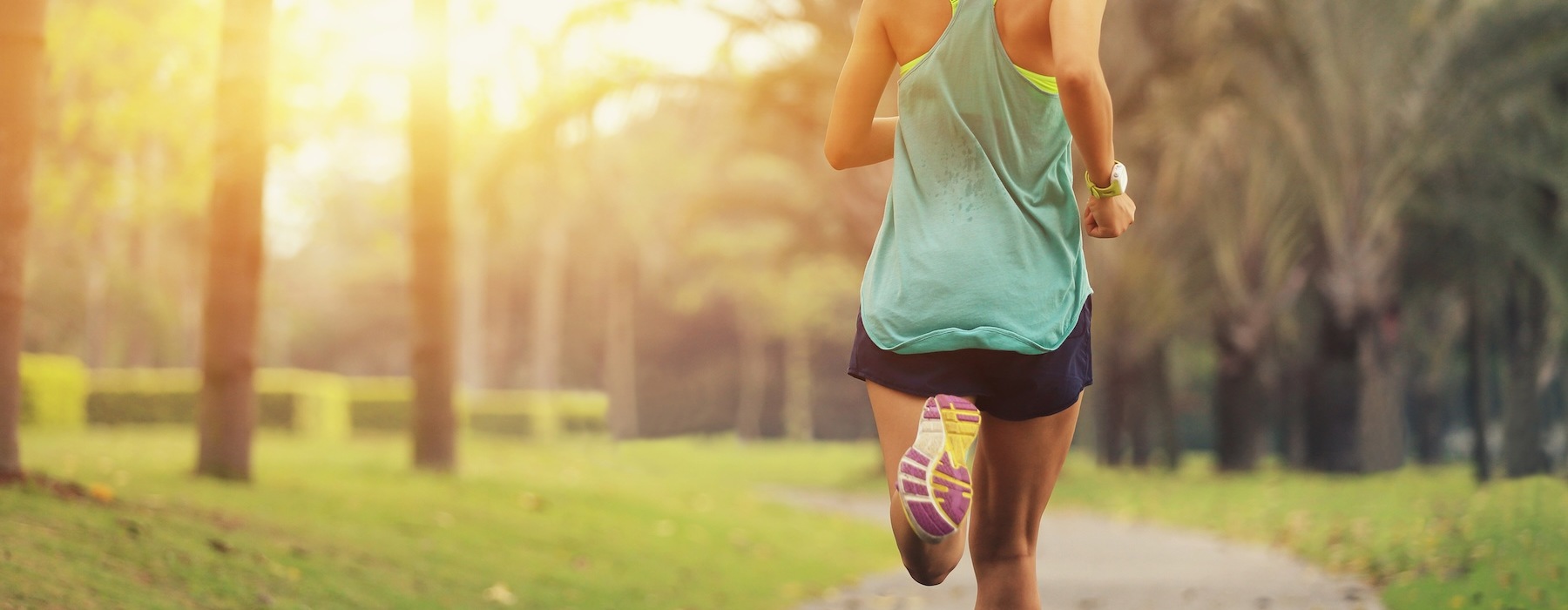 a woman running on a path