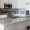 a kitchen with white cabinets